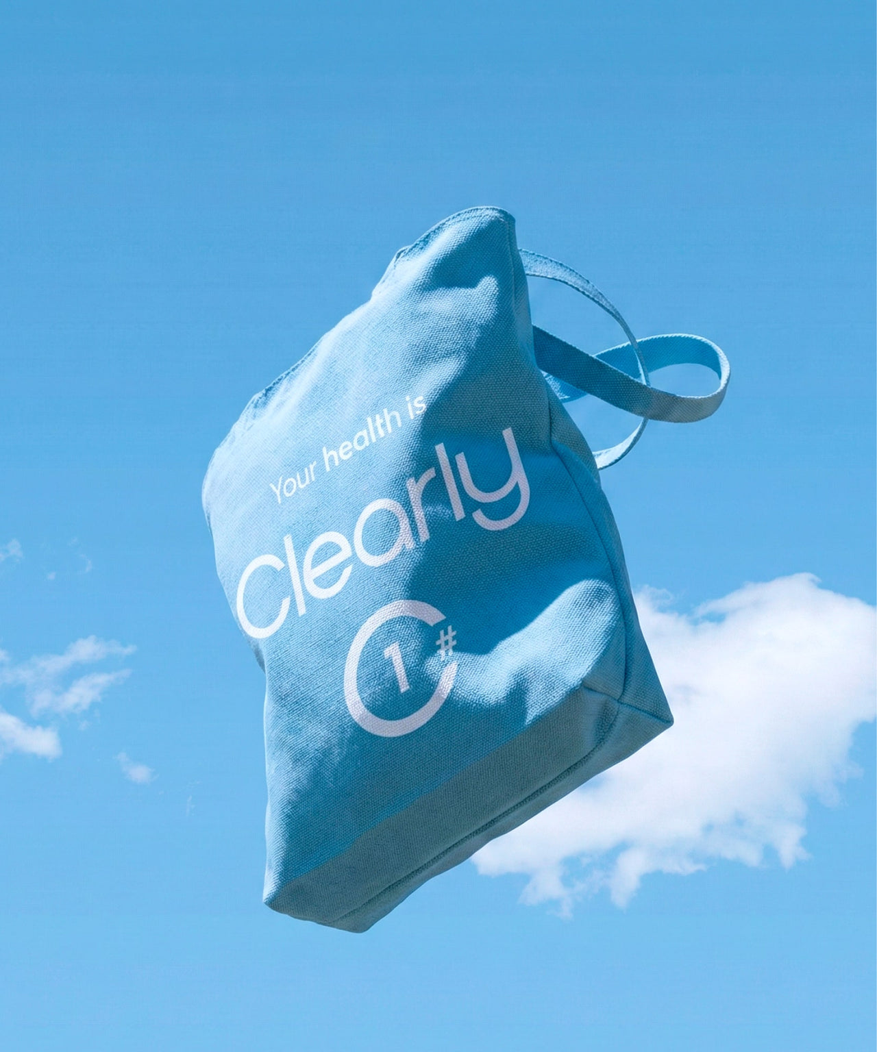 Clearly brand clear plastic bag with flying design, showing its lightweight, transparent material and spacious interior.