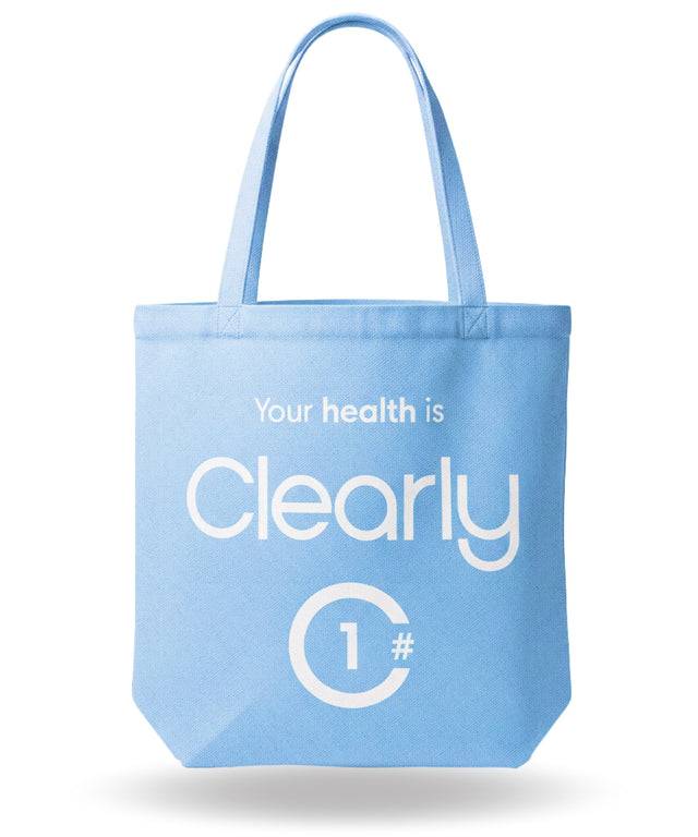 Clearly Bag front view showing transparent design with sturdy handles, ideal for organizing and carrying everyday essentials.
