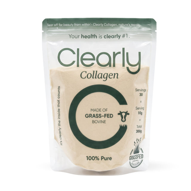 Clearly grass-fed collagen powder in a jar, showing the white powder texture and label on the container.