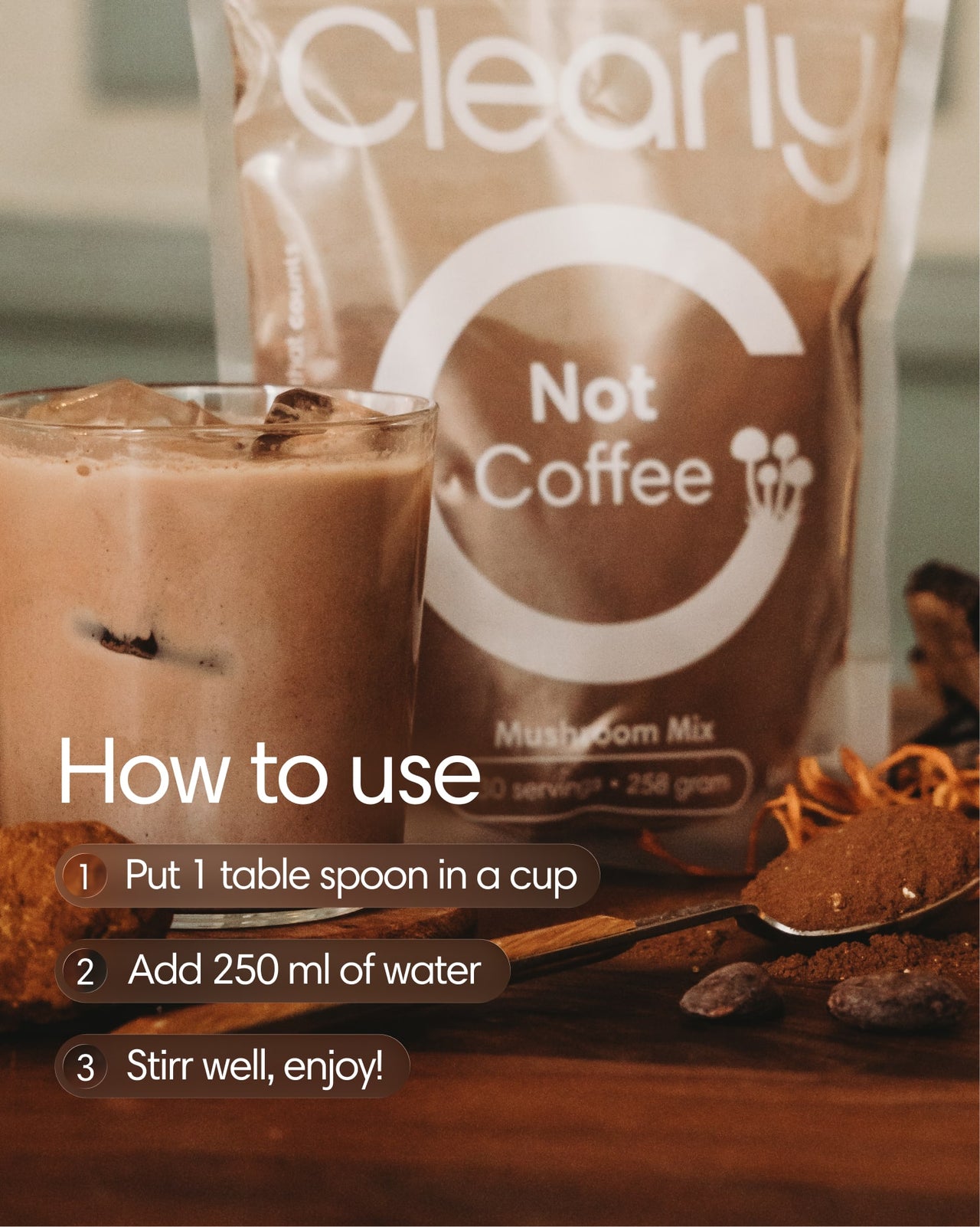Clearly Not Coffee powder in a jar with a scoop, ready to be mixed for a coffee substitute.